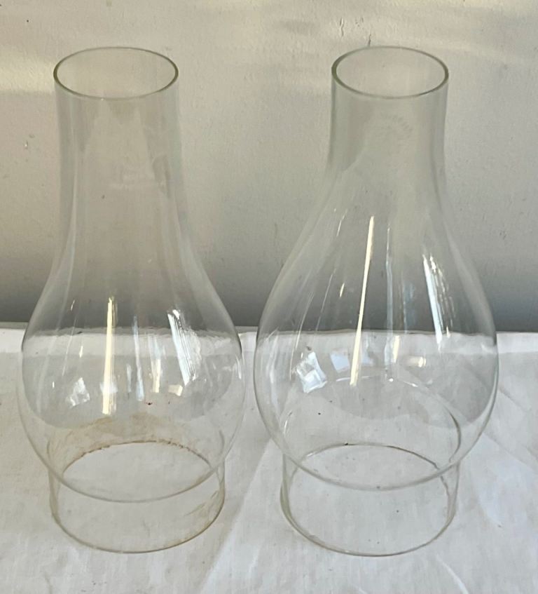 Two oil lamp glass chimneys