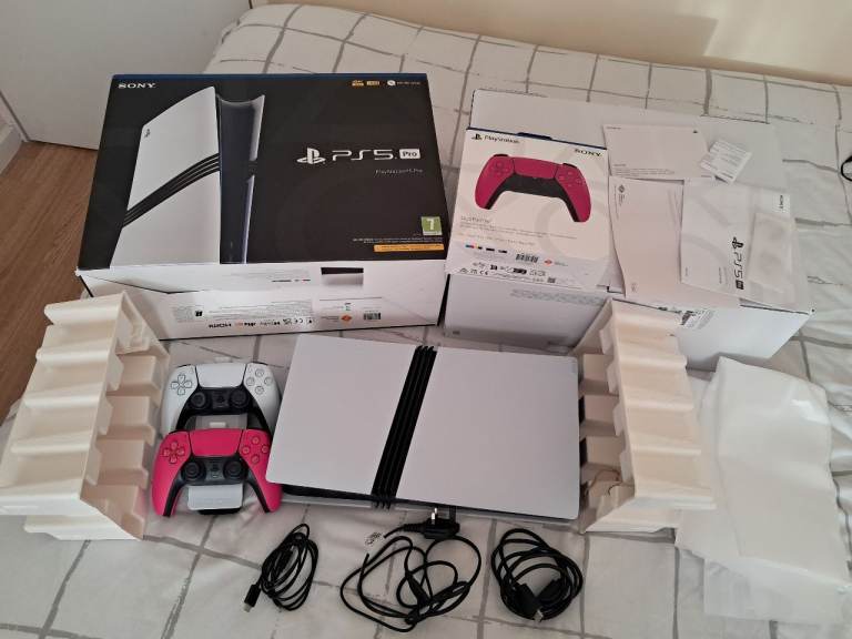 PS5 Pro with extra controller & headset