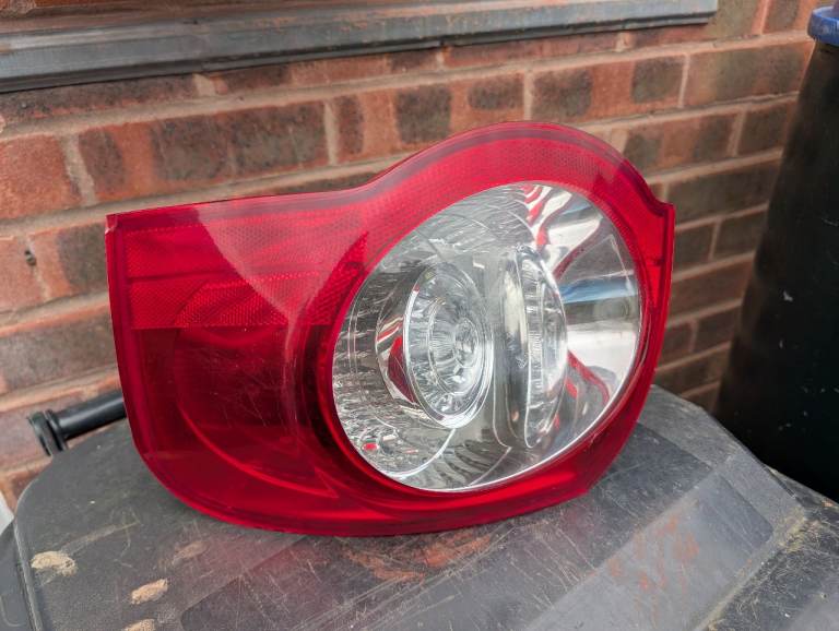 Drivers side B6 Passat estate rear light cluster