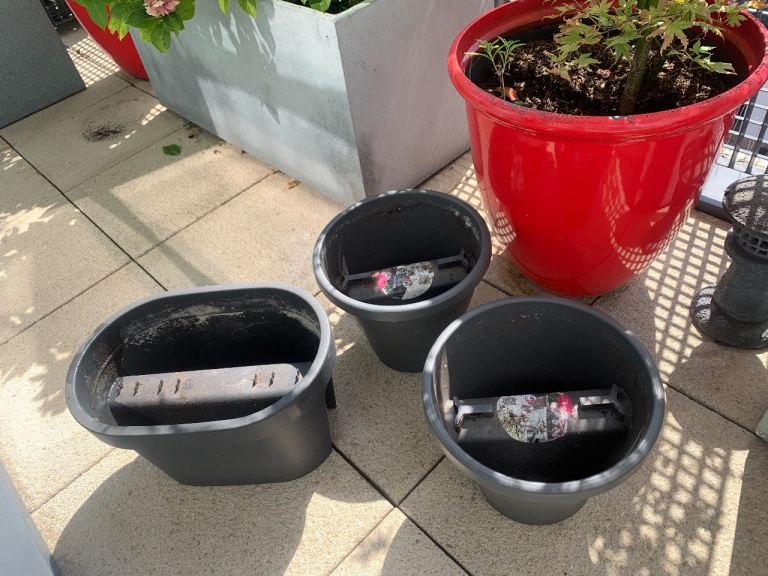 Three balcony flower pots