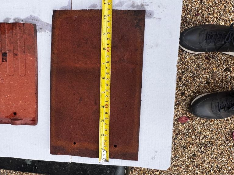 Reclaimed brown clay roofing pin tiles