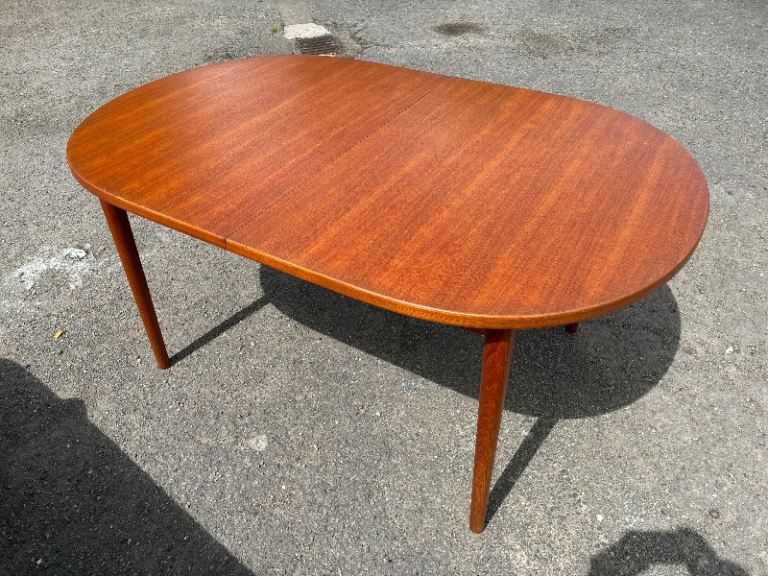 Gorgeous Nils Jonsson for Troeds Swedish Mid Century 1960s teak extendable dining table. Seats 10