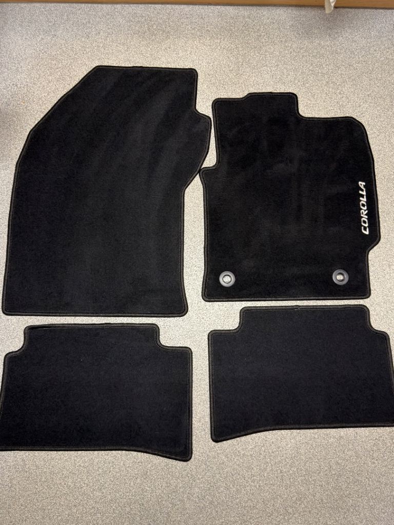 Barely used as new genuine oem  Toyota Corolla full car mat set.