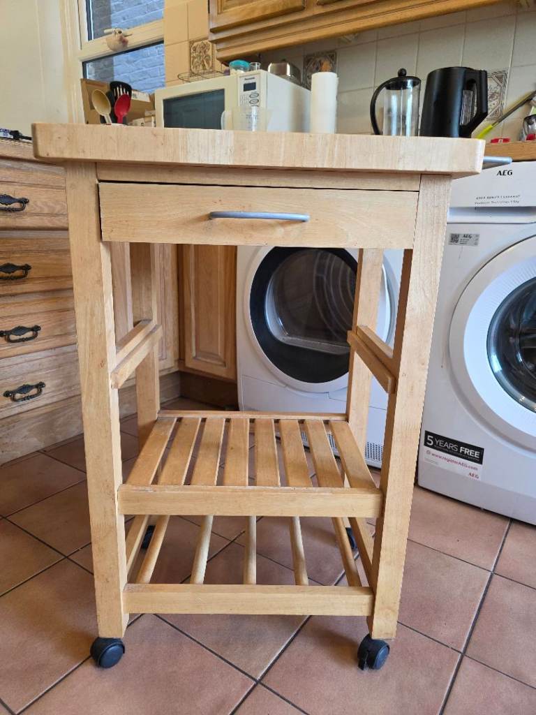 Free standing kitchen block with wheels. Beautiful light wood