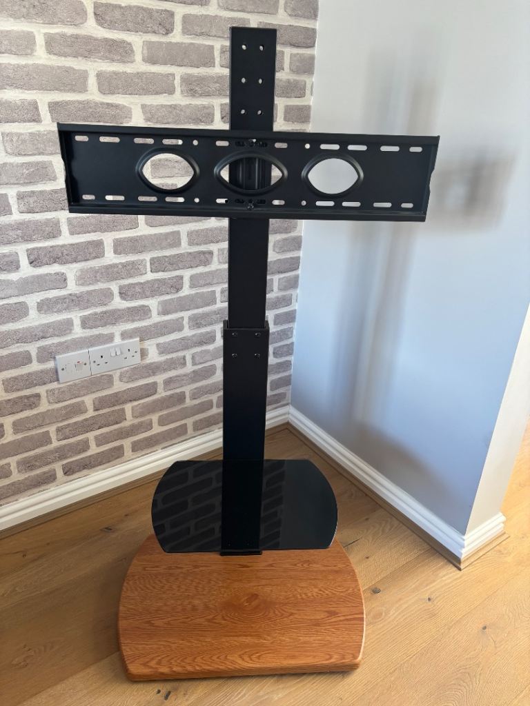 Black TV Stand with Wooden Base – Good Condition