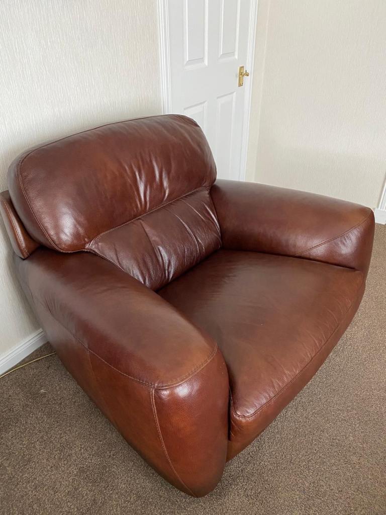 Brown Leather Suite inc 2 X one seaters and a pouffe
