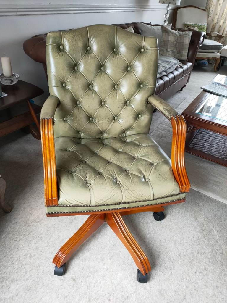 A leather chesterfield captains chair 