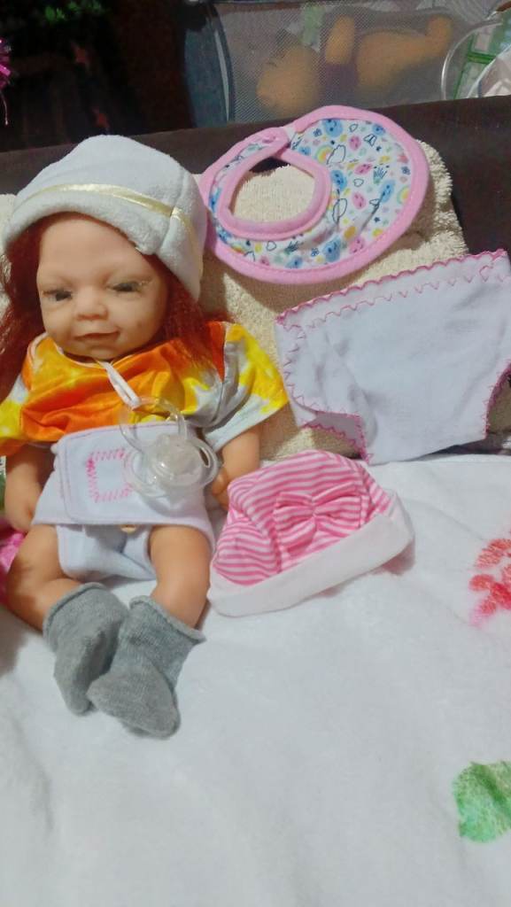 Cute 12 inch solid silicone reborn doll
