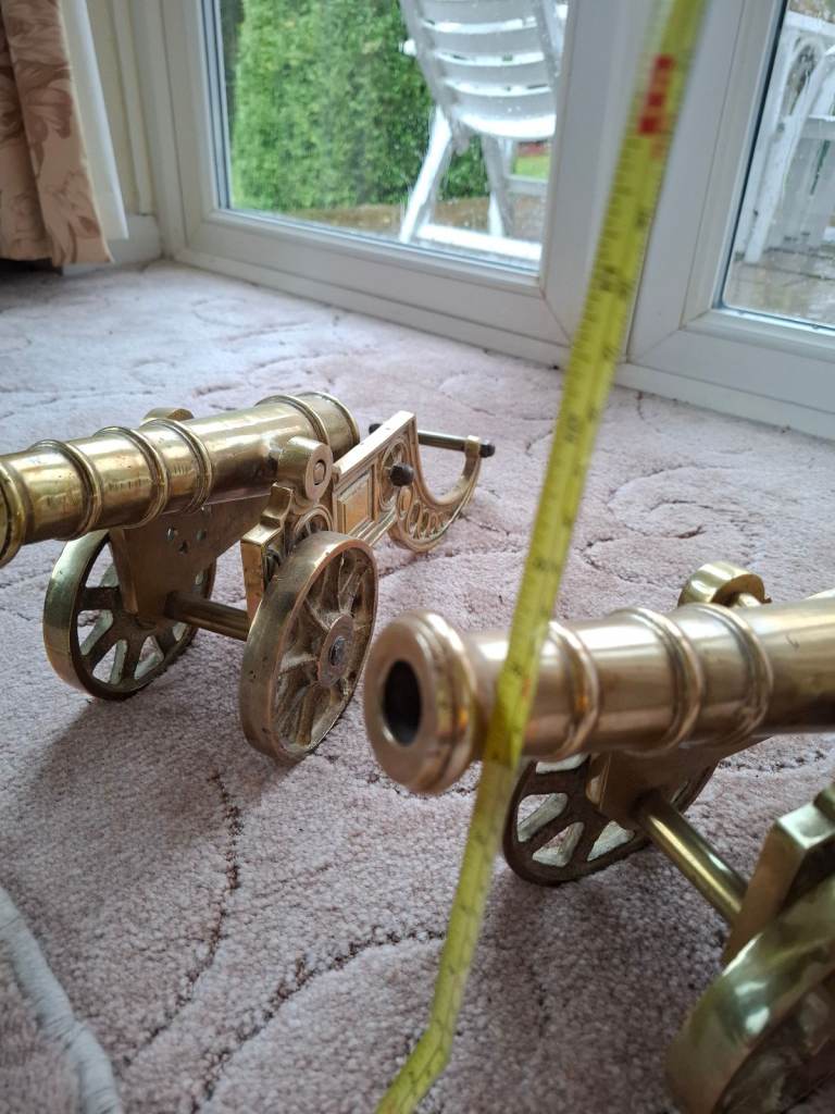 Vintage pair of large brass cannons