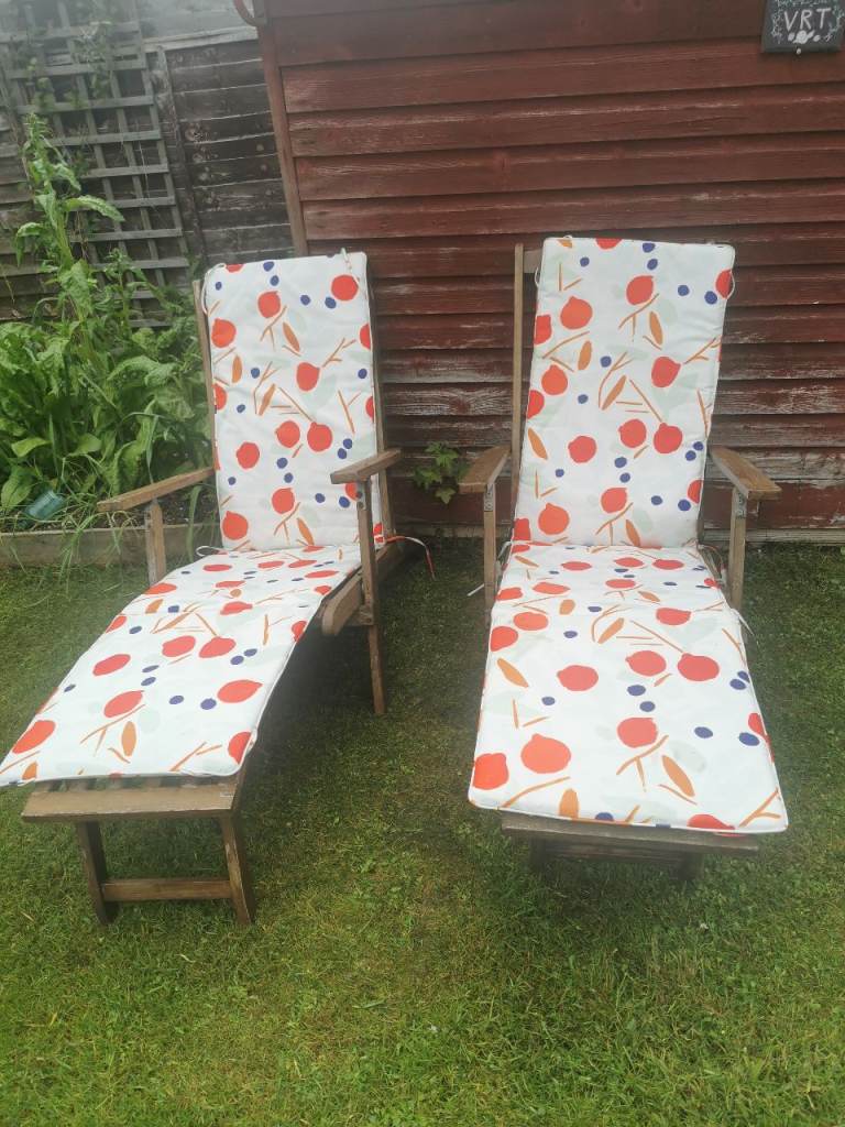 Two Wooden Reclining Garden Chairs with Cushions