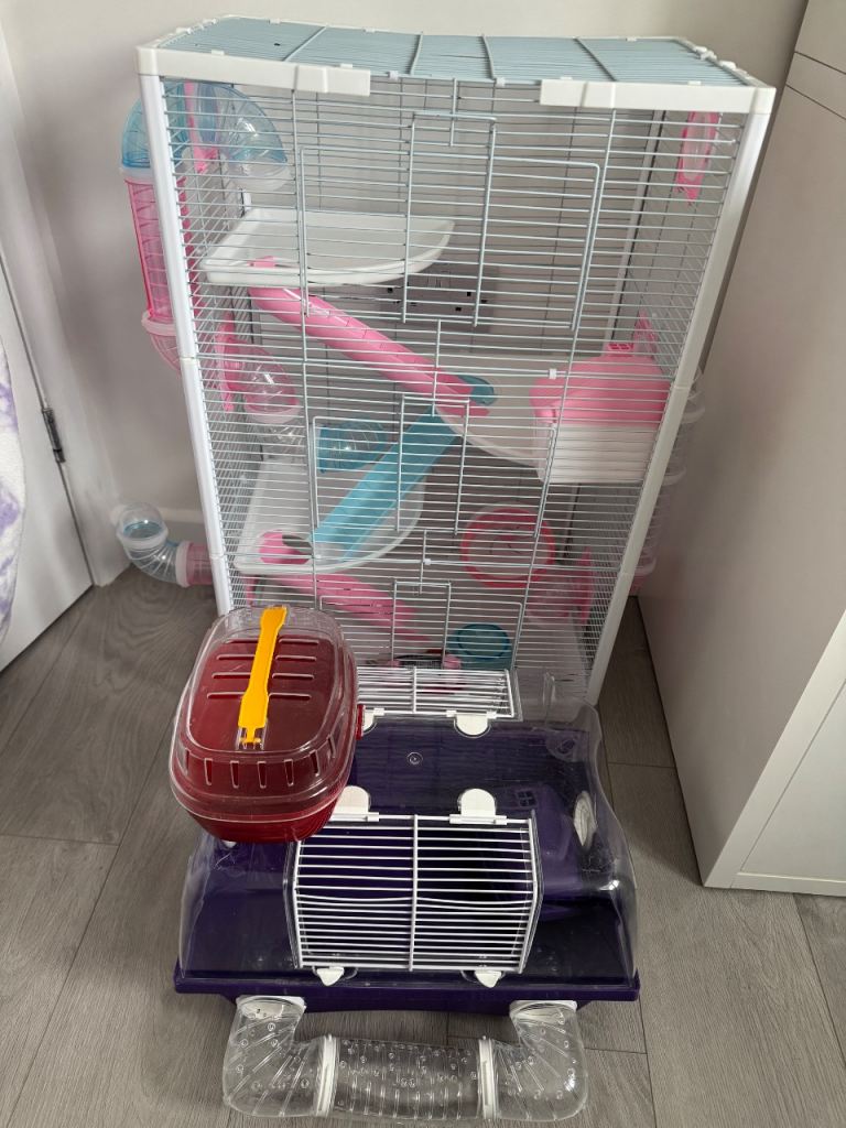 Two Hamster cages and travel box 