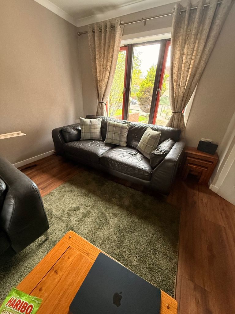 Comfortable Grey Leather Sofa – Good Condition