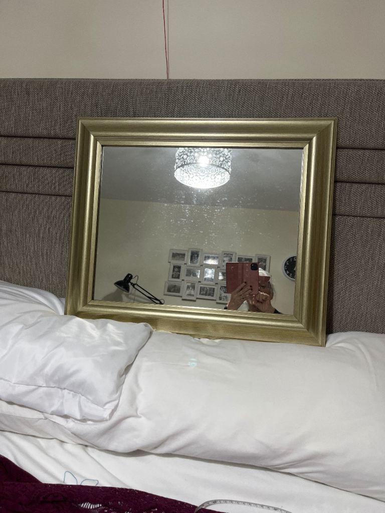 Brass coloured mirror