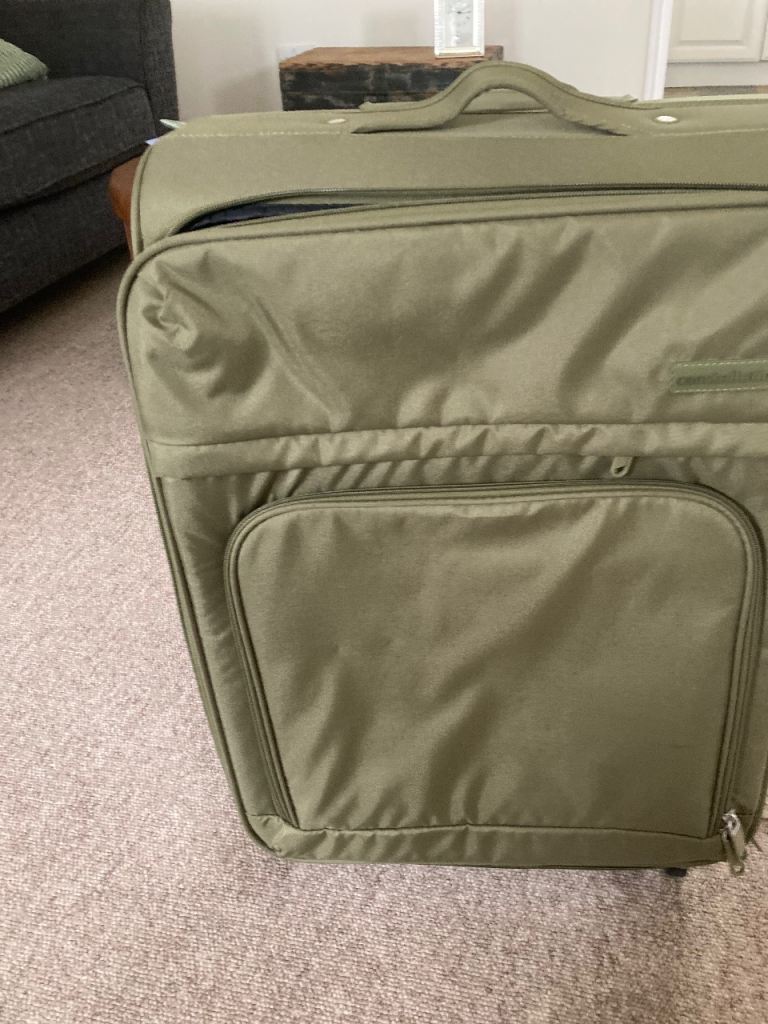 Green Suitcase with Wheels – Good Condition