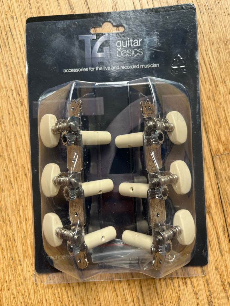 Job Lot of guitar parts inc. machine heads, pickguards, jack sockets, control knobs, boxed & new