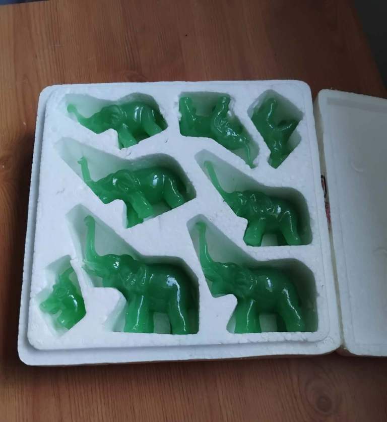 Set of 8 jade elephants 