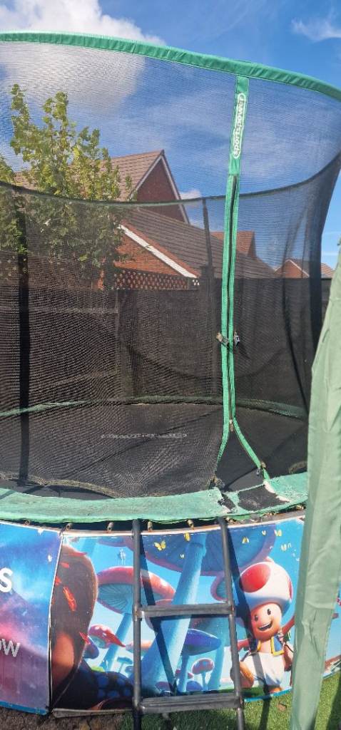 Kids Trampoline with Safety Net and Ladder – Good Condition