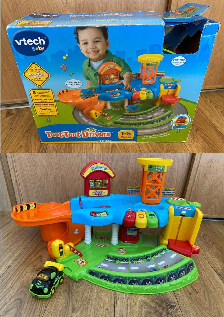 V TECH TOOT TOOT DRIVERS GARAGE WITH 1 TOOT TOOT CAR & ORIGINAL BOX