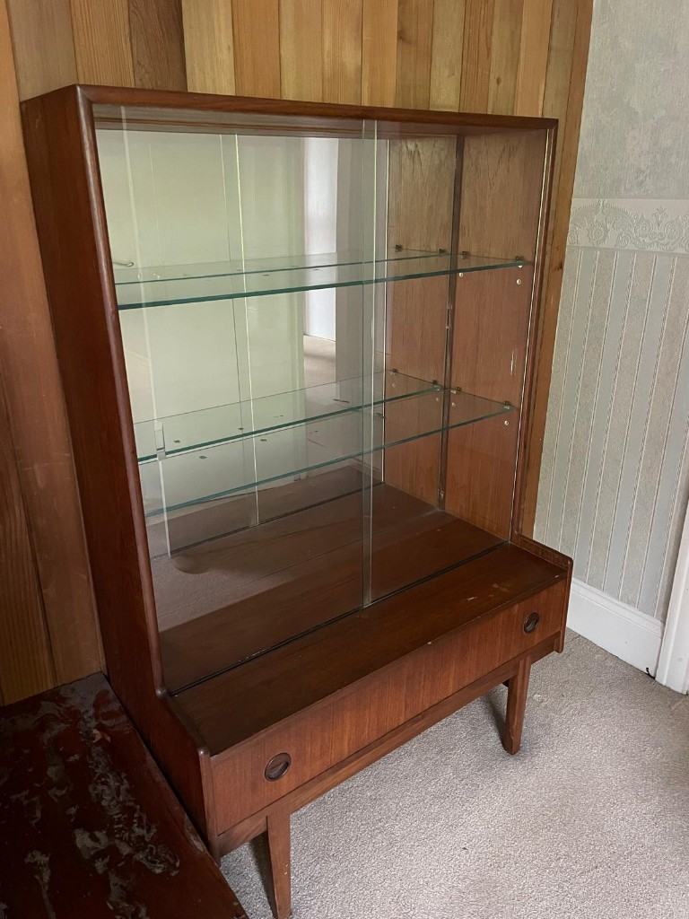 Wooden used display cabinet with glass sliding doors and drawer