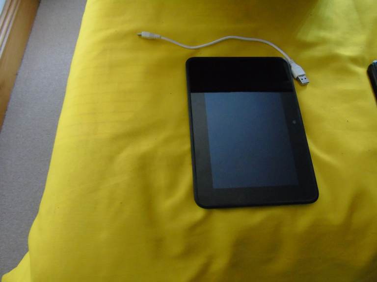 Black Tablet with USB Cable – Good Condition