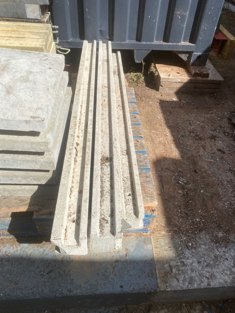 Five concrete corner fence posts 1800mm long