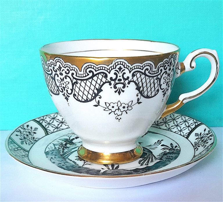 RARE TUSCAN CUP and SAUCER - intricate design with Herons - 12 cm diameter - VERY GOOD