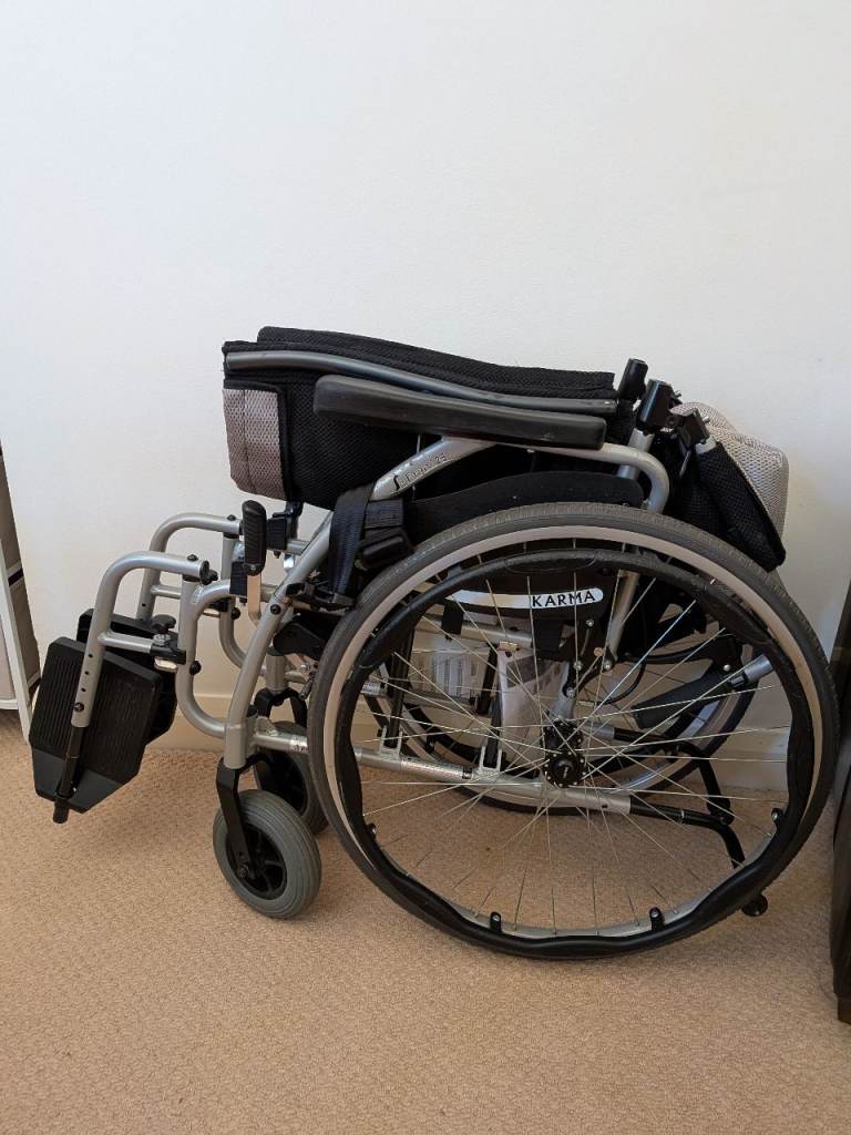 Manual padded wheelchair 