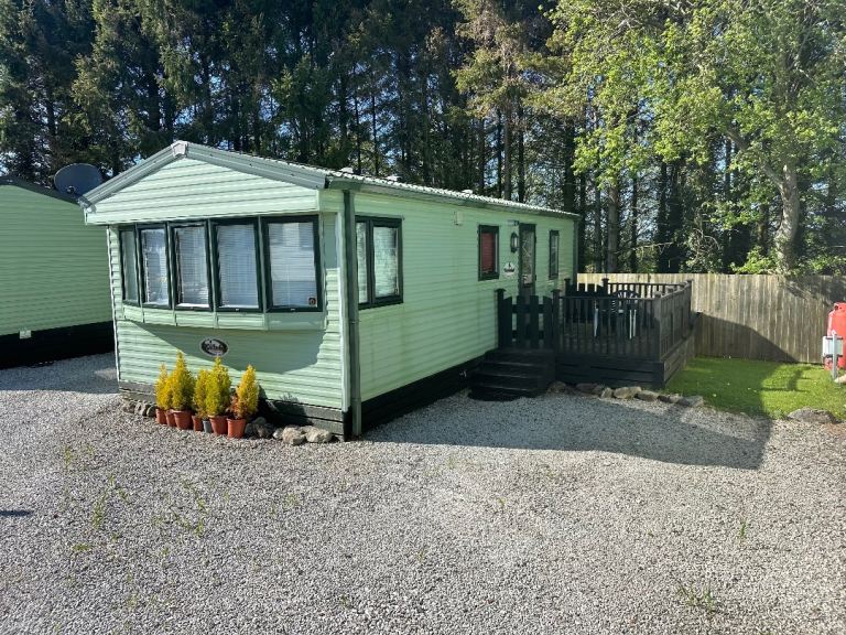 Cheap static caravan for sale on 12 month pet friendly park. Decking included & low site fees