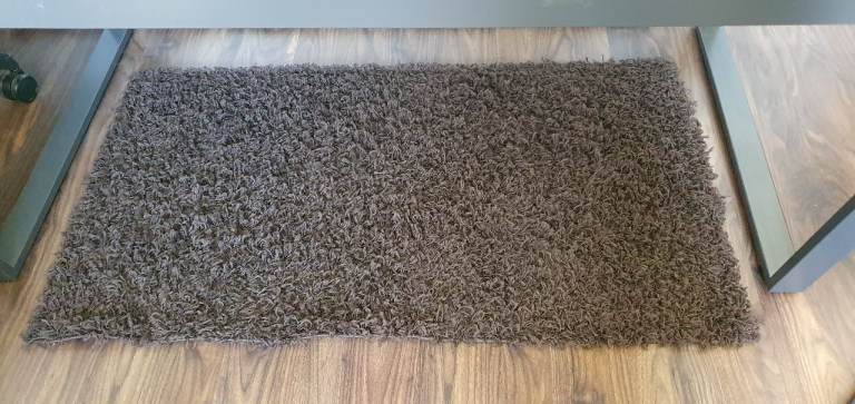 brown rug next 100% polypropylene