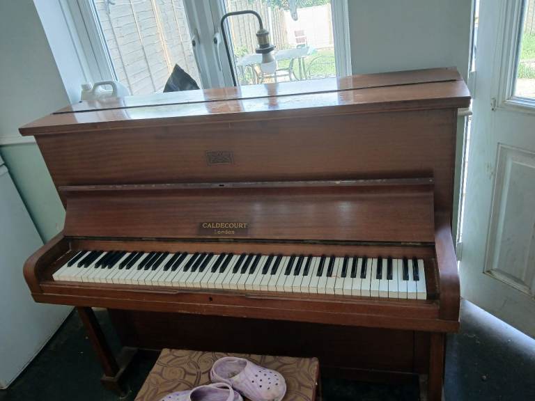 Free  piano  collection  only