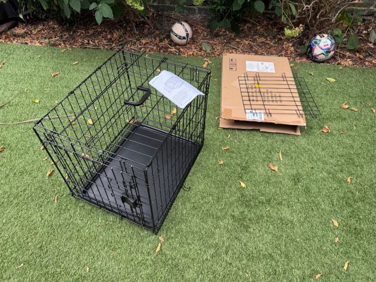 Amazon basics dog crate. 61x46x51