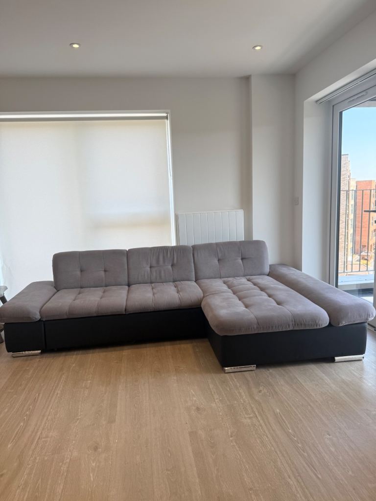 Comfy Grey L-Shape Sofa with bed – Good Condition