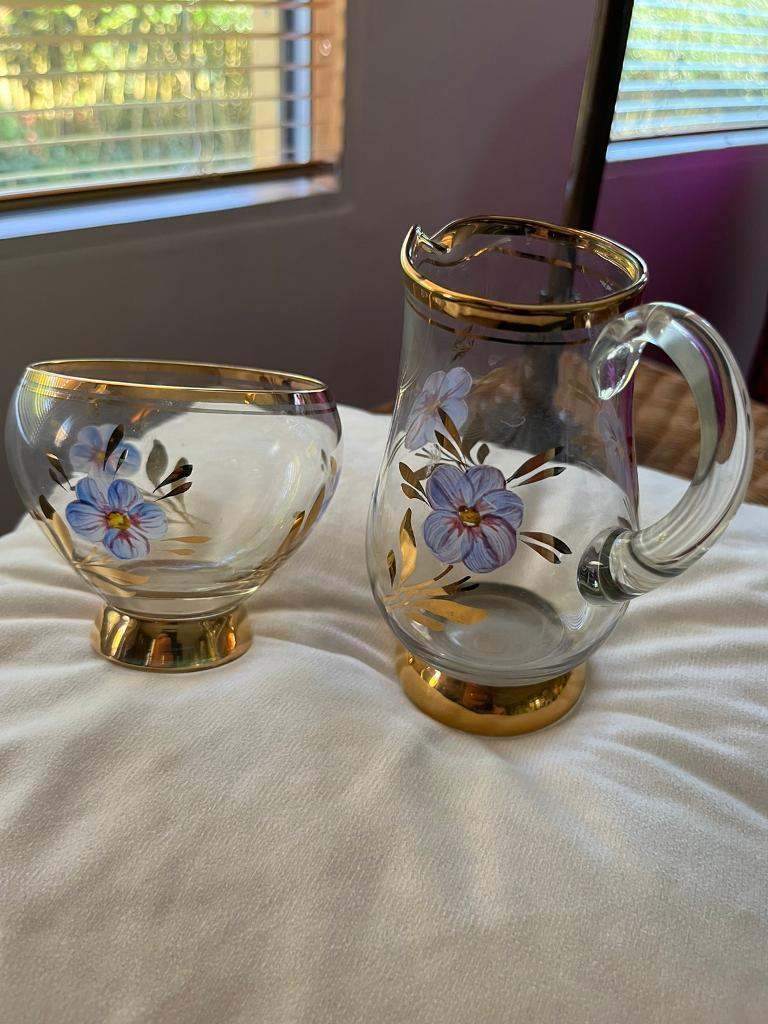A vintage Romanian Glass creamer and sugar set 