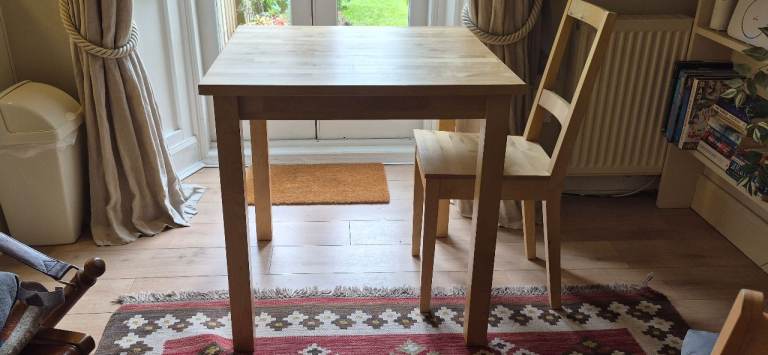 Small dining table and matching chairs