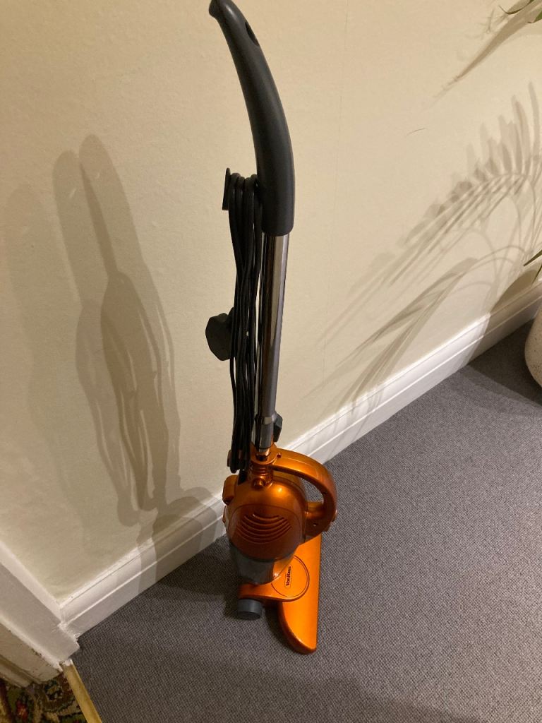 Small Powerful corded bagless stick hoover