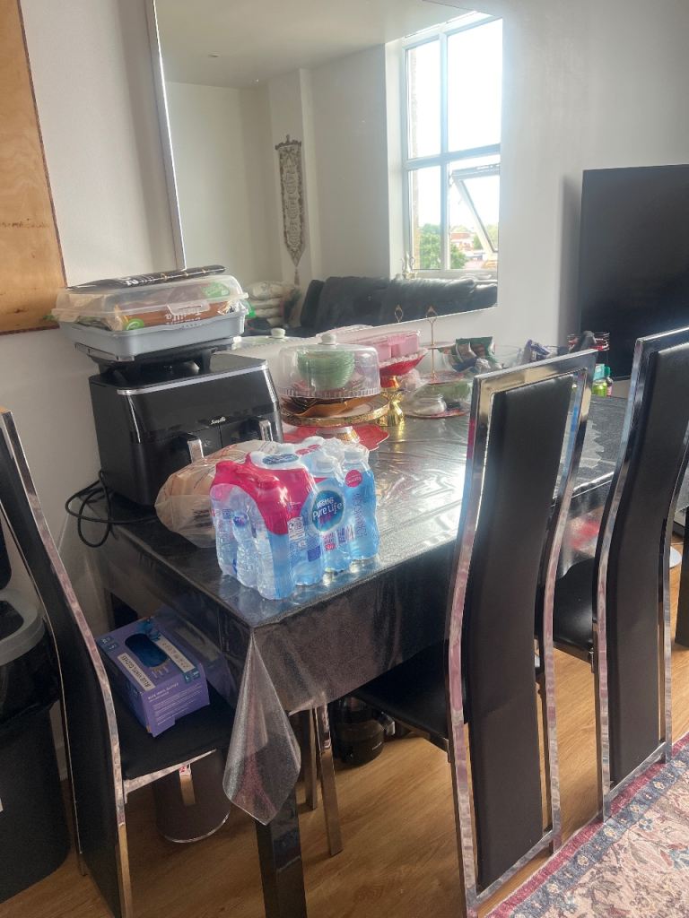 Modern Black Dining Table with 4 Chairs – Good Condition