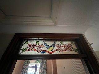 Stained‑glass transom window