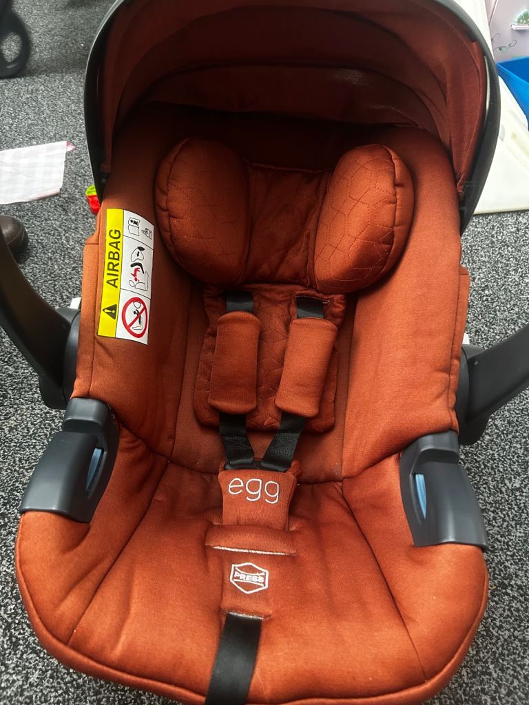 Egg2 travel system in colour paprika with adapters for making double and extra seat in navy.