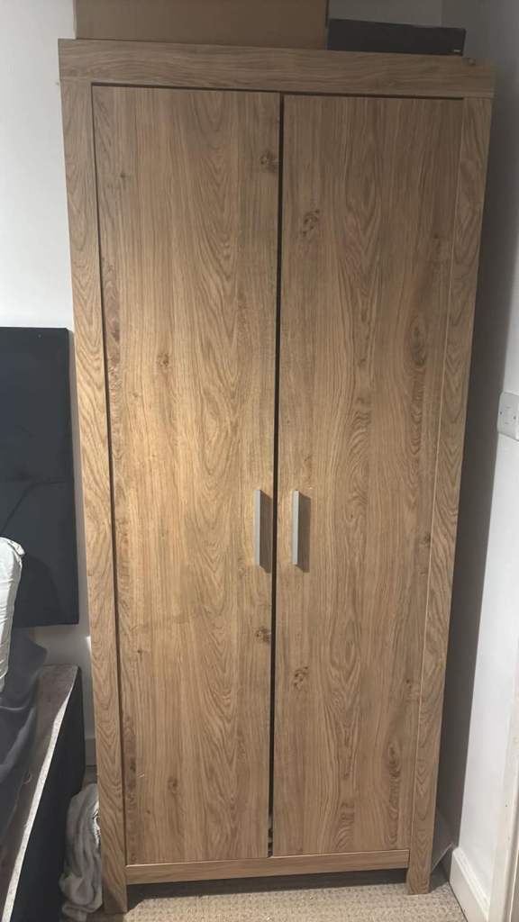 Wardrobe with shelf at the top