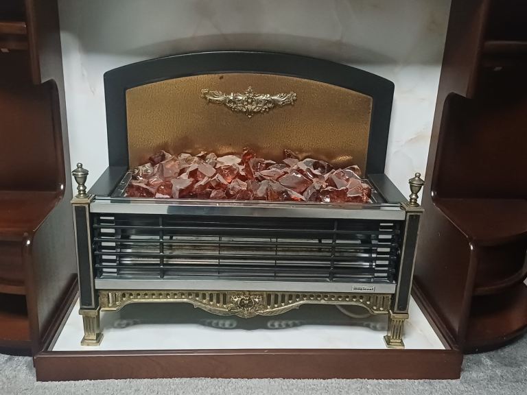 Old vintage Fireplace with cabinet shelves 