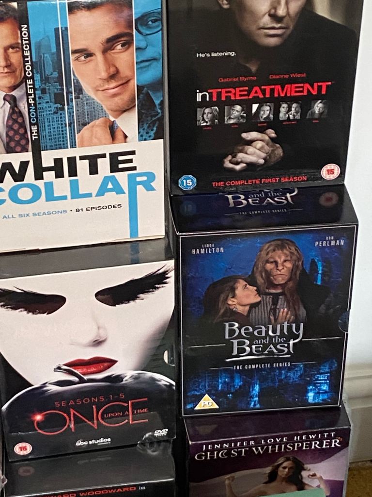 Job lot of DVDs and cassettes 