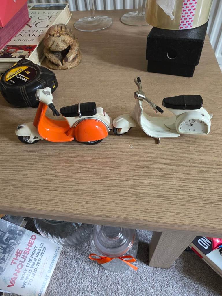 Two vespa scooter ornaments 