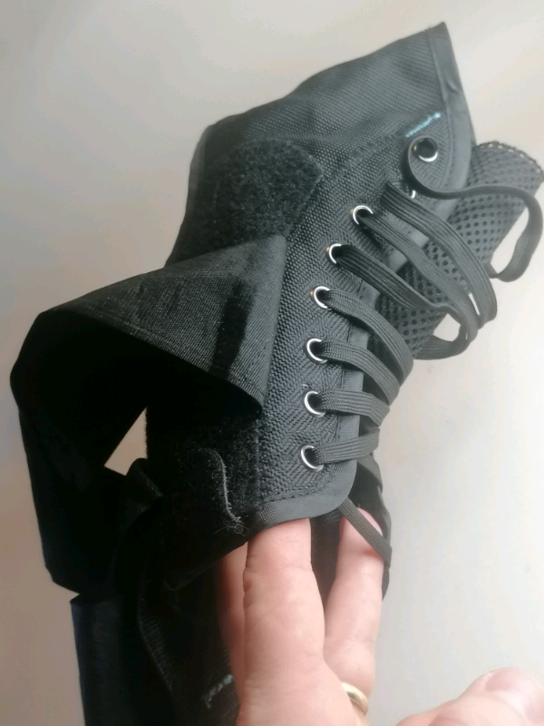 Medical boot for Plantar and Achilles issues. It ties in front. 