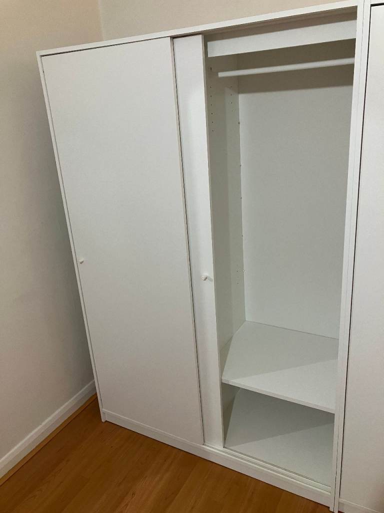 White wardrobe with sliding doors