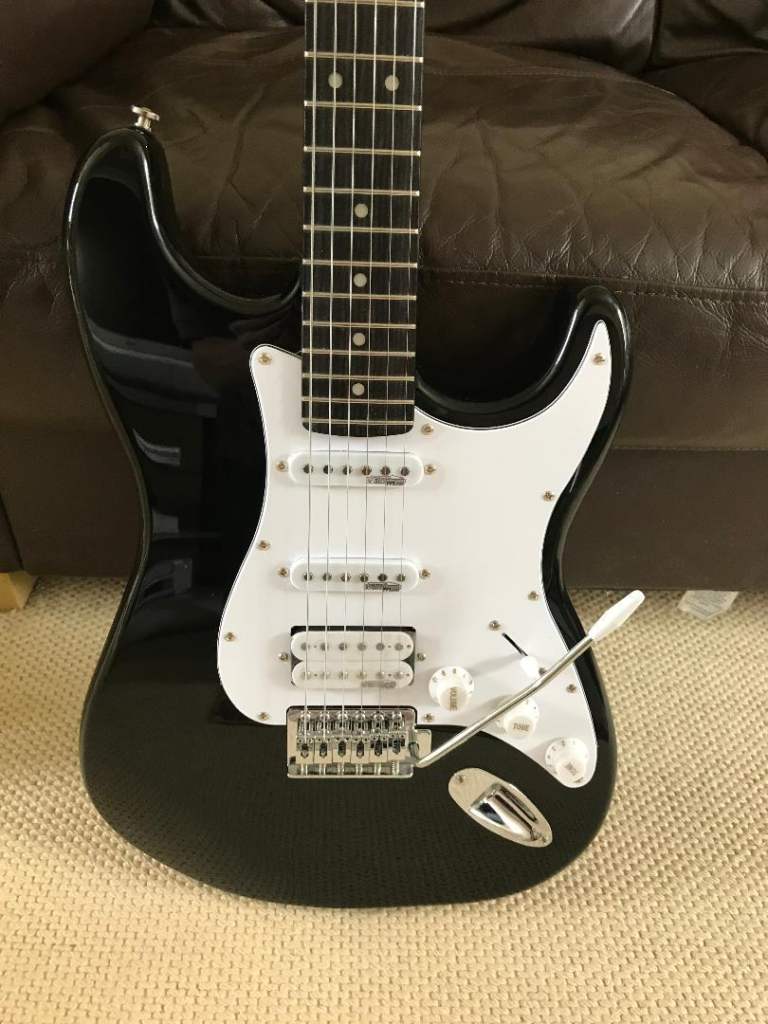 STRATOCASTER with WILKINSON PICKUPS and GIG BAG etc. TOTALLY AS NEW.   ONLY £85.
