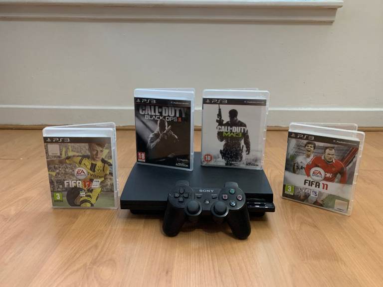 Sony PlayStation PS3 Slim Console with Controller and 4 Games