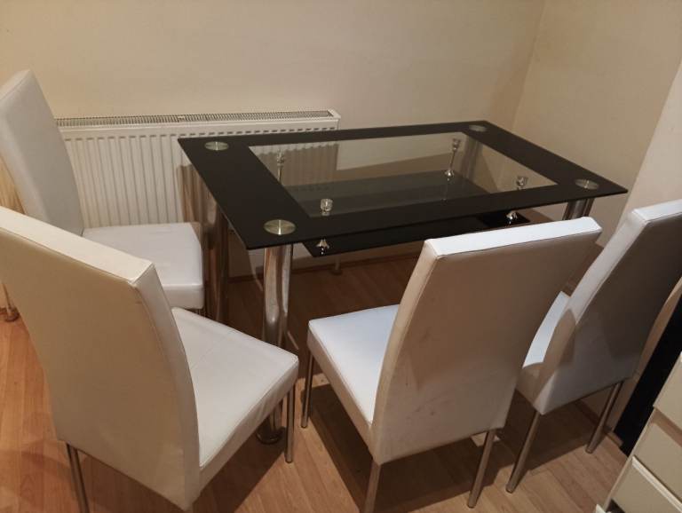 image for Come on, sell qucikly, one table and 4 leather chairs