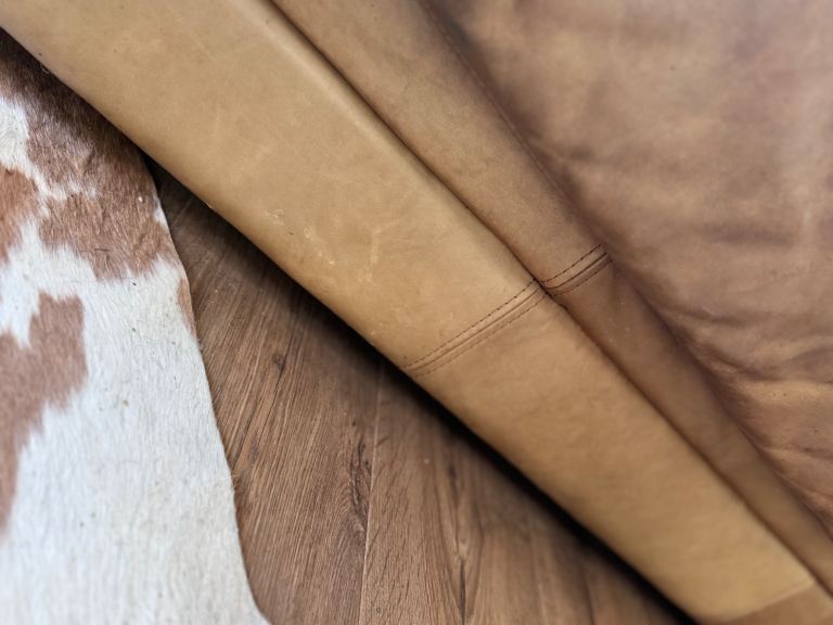 Tan Italian leather sofa original cost £2300