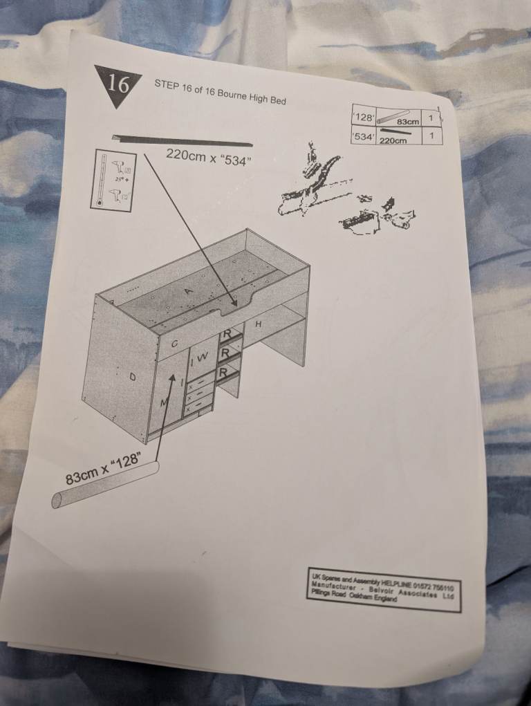Cabin bed with built-in wardrobe and workstation. 