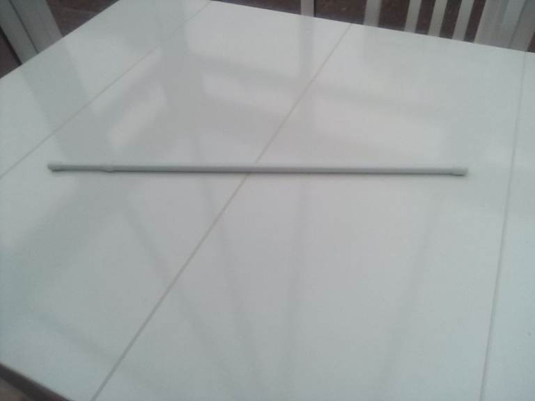 New curtain tension rod pole.